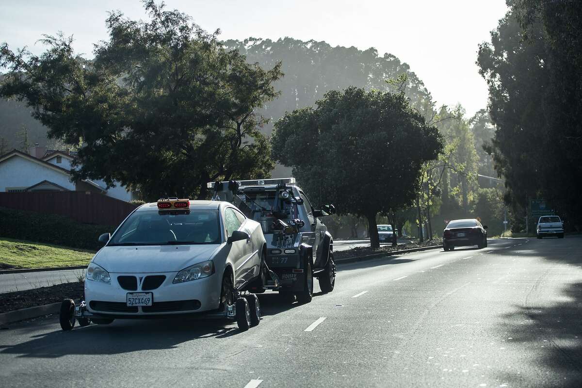 A car is towed away from the scene of a shooting at the YouTube headquarters in San Bruno, Calif., Tuesday, April 3, 2018. (Photo by Joel Angel Juarez / Special to the Chronicle)