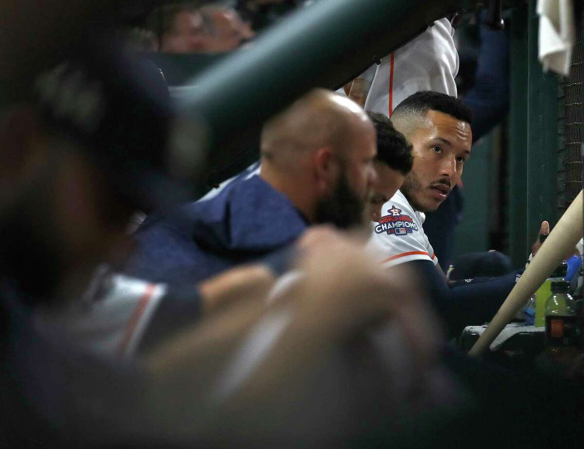 Houston Astros shortstop Carlos Correa (1) in the dugout during the fifth inning of an MLB baseball game at Minute Maid Park, Tuesday, April 3, 2018, in Houston.