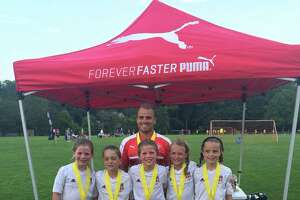 New soccer coach Luke Green hopes to turn program around - Photo