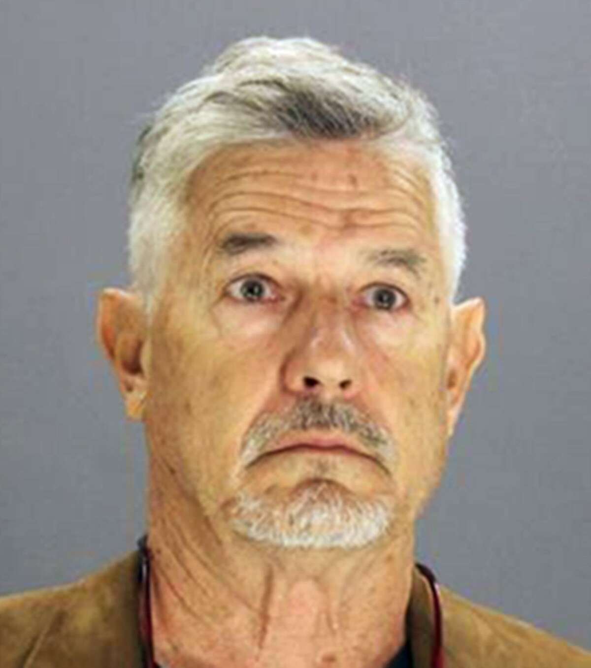 This photo provided by the Dallas County Sheriff's Department shows John Timothy Schooley, one of the designers of a Kansas water park slide that decapitated a 10-year-old boy in 2016. Schooley was arrested by federal authorities late Monday, April 2, 2018, in Dallas. Schooley and Jeffrey Henry, a co-owner of Texas-based Schlitterbahn Waterparks and Resorts, were indicted last week by a grand jury in Kansas. Schooley will be held in Dallas pending his arraignment and extradition to Kansas on charges that include second-degree murder. (Dallas County Sheriff's Department via AP)