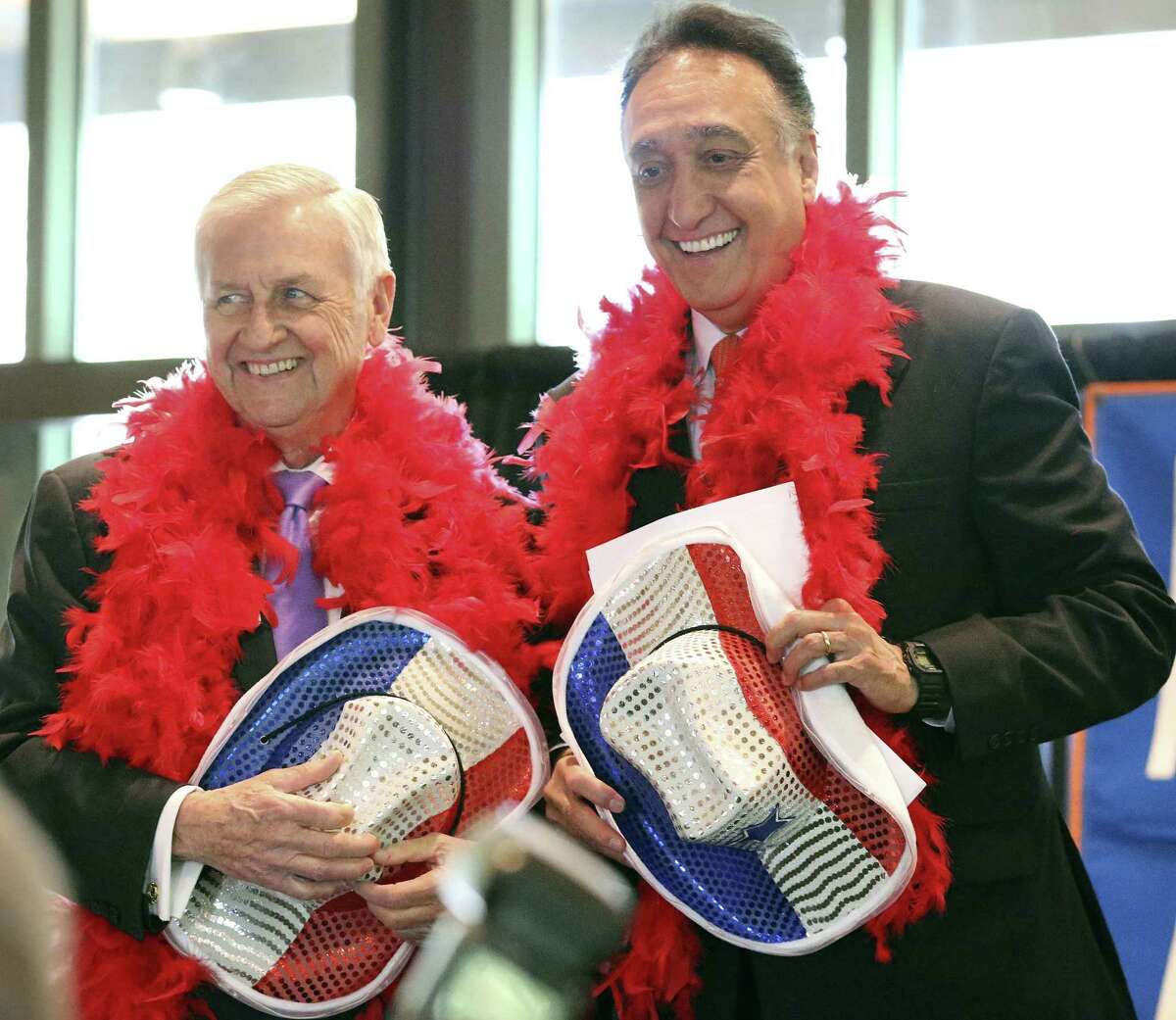 Emcees John Montford and Henry Cisneros are asked to wear special attire for their appearance at a luncheon for the Greater San Antonio After-School All-Stars program at the Briscoe Western Art Museum on April 4, 2018.