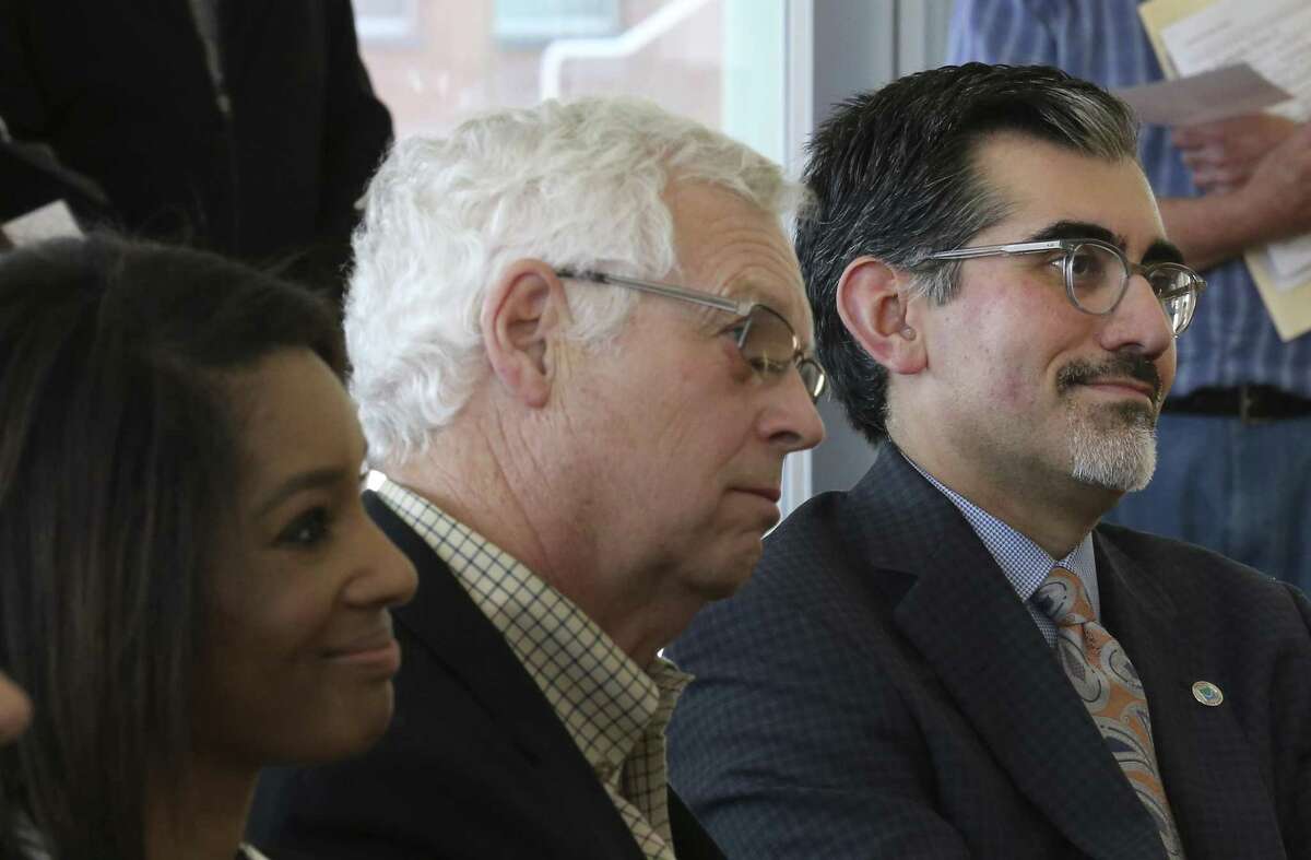 Incoming chancellor of the Alamo Colleges, Mike Flores (right), then president of Palo Alto College, at an April event introducing him to community members. (Kin Man Hui/San Antonio Express-News)