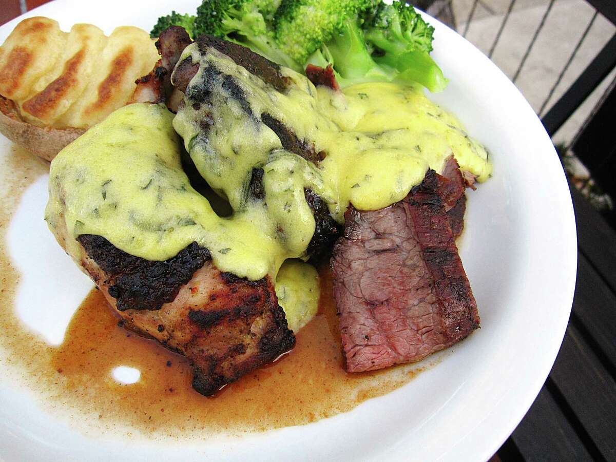 A mixed grill with a lamb T-bone, marinated flank steak and chicken with bearnaise, a twice-baked potato and steamed broccoli from Outlaw Kitchens on North Flores Street in San Antonio. The restaurant will feature a $35 curated three-course dinner during Culinaria Restaurant Weeks, which run from Aug. 10-24.