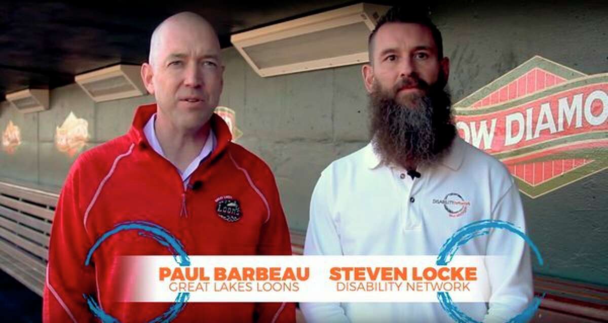 Great Lakes Loons President Paul Barbeau, left, and Disability Network of Mid-Michigan Executive Director Steven Locke are seen in this image taken from a video. DNMM will be the presenting sponsor of accessible services at Dow Diamond for the 2018 baseball season. (Photo provided)