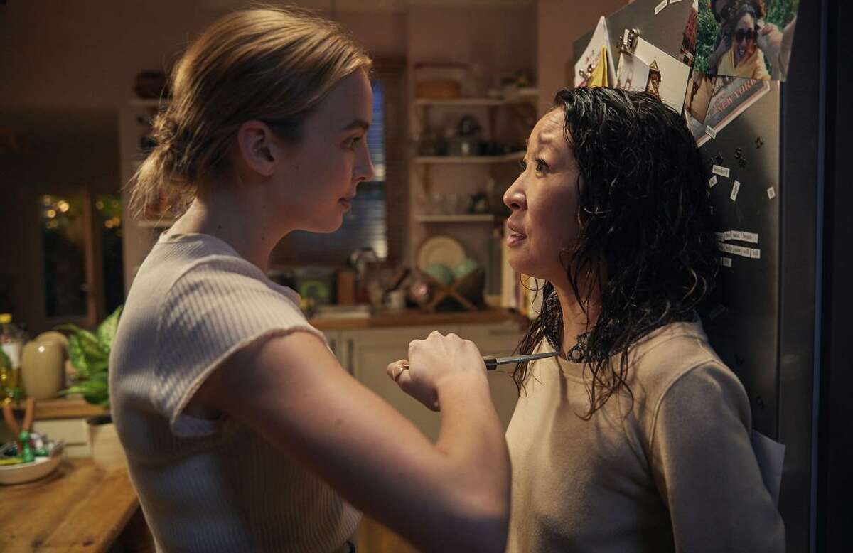 Jodie Comer (left) stars as an assassin, and Sandra Oh as a security expert for the British MI5, in BBC America’s new intrigue drama “Killing Eve,” a sometimes wacky look at people devoted to their polar- opposite and high-stakes work missions.