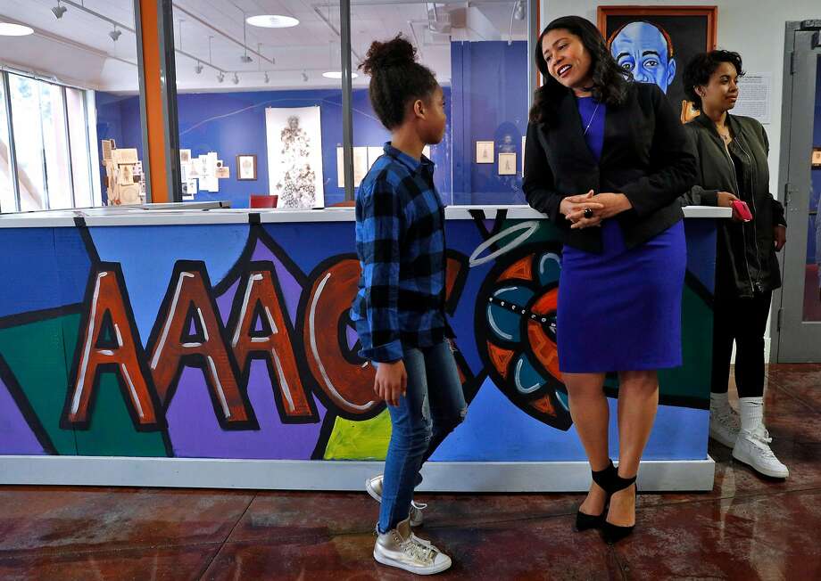 San Francisco Board of Supervisors President and mayoral candidate London Breed, chats with Bianca Rachelle Bougere, 10, as she visits the African American Art & Culture Complex in San Francisco, Calif., on Monday, March 12, 2018. As a child, Breed grew up in the Western Addition neighborhood and spent a great deal of time at the complex, eventually becoming the executive director and overseeing its major renovation. Photo: Carlos Avila Gonzalez / The Chronicle