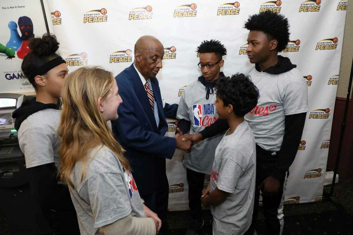 Former New York Knicks’ star Dr. Dick Barnett speaks with students and athletes as part of Signature Bank’s Scholars Program, which encourages young people to be college bound. In conjunction with Stamford Peace Youth Foundation and Beyond Limits Academic Program, all three organizations joined together to sponsor an event on Thursday at the State Theatre in Stamford, where Barnett addressed the students in a motivational manner about the importance of a college education.