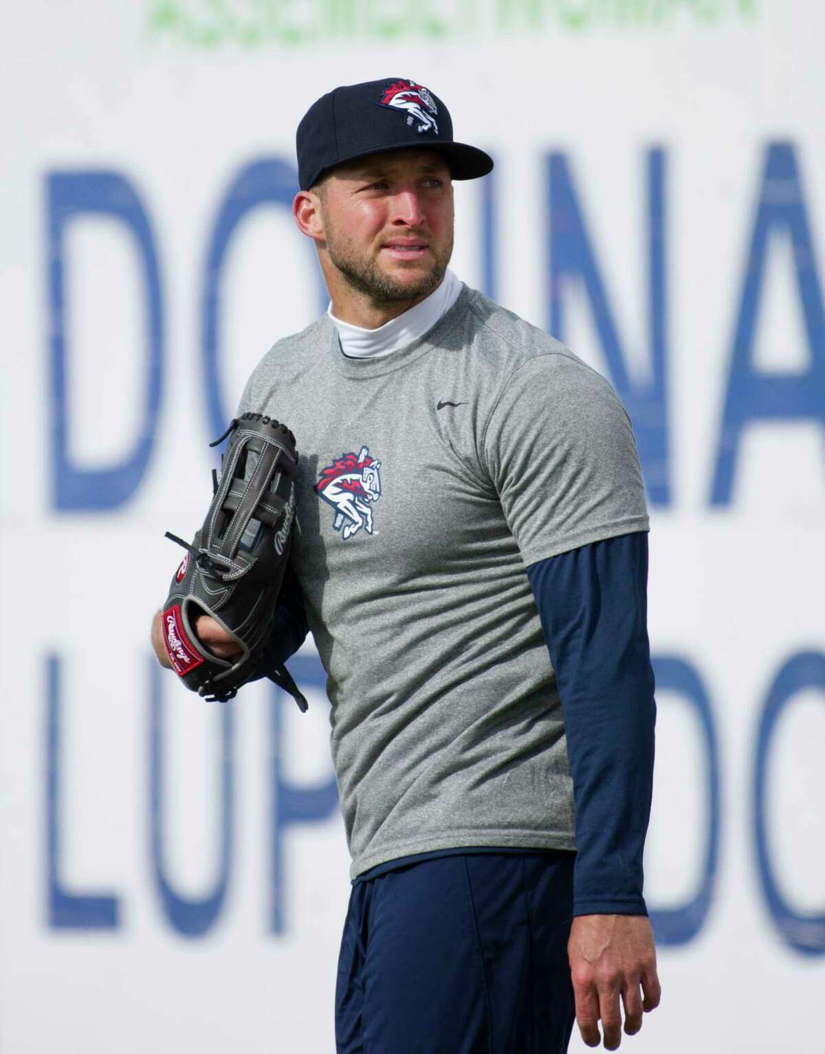 New York Mets outfielder Tim Tebow warms up before his debut with the Binghamton Rumble Ponies minor league baseball team as they host the Portland Sea Dogs, Thursday, April 5, 2018, at NYSEG Stadium in Binghamton, N.Y.