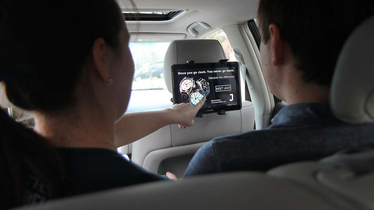 Startup Vugo makes software for tablet displays in the back seats of ride-hailing cars that show videos and commercials.