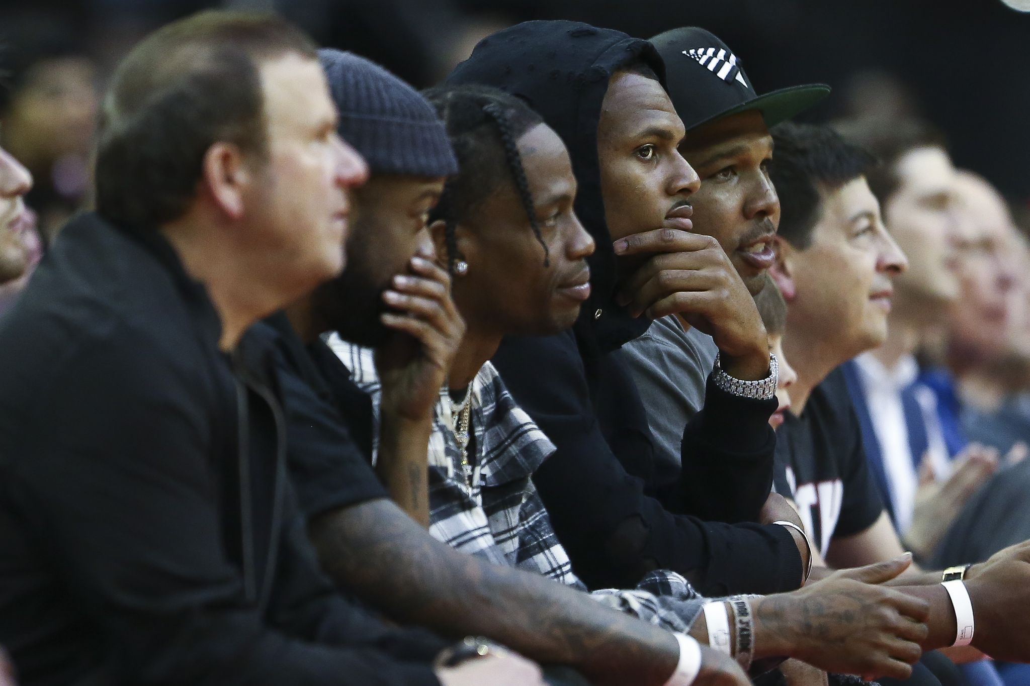 Hip hop performer Travis Scott cheers on the Houston Rockets before Game 2  of the team's first-round NBA basketball playoff series against the  Minnesota Timberwolves, Wednesday, April 18, 2018, in Houston. (AP