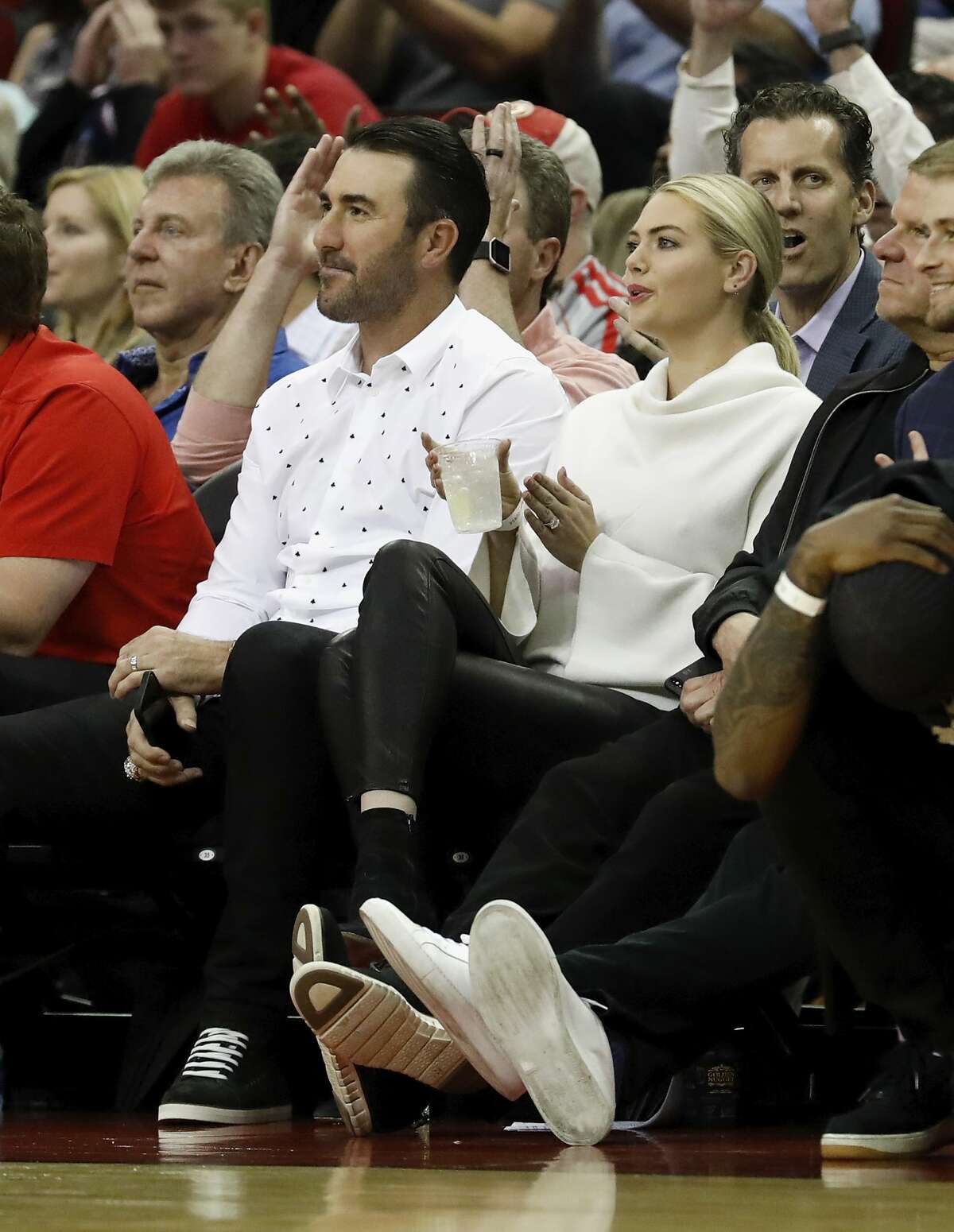 Kylie Jenner, Travis Scott sit courtside at Rockets playoff game