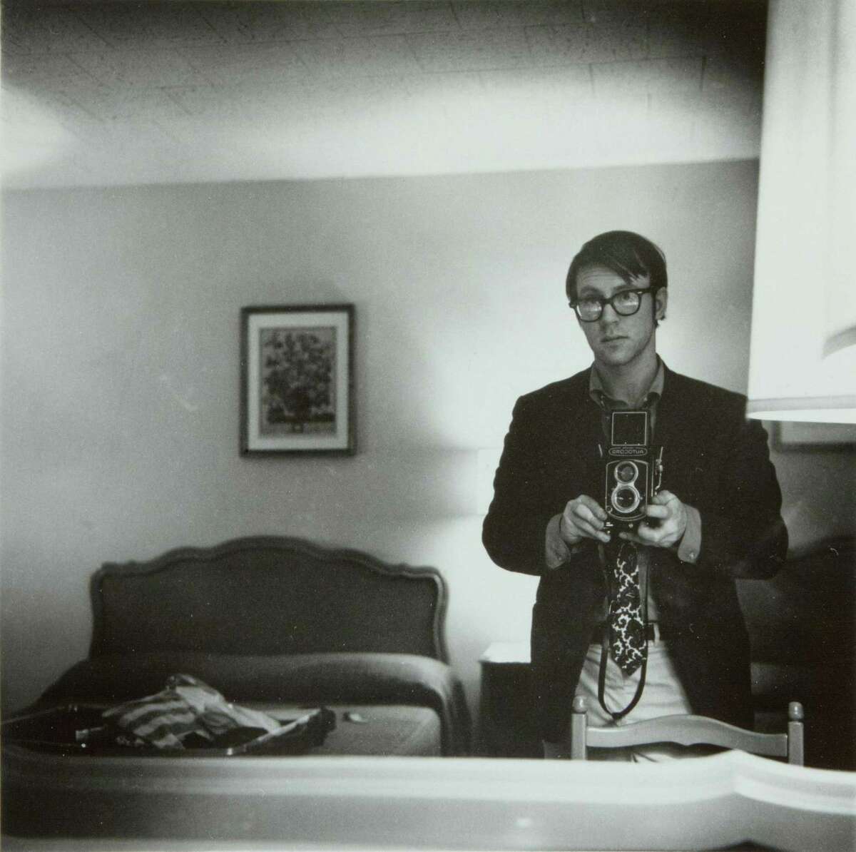 The Bruce Museum will open ‘In Time We Shall Know Ourselves,’an exhibition of black-and-white photographs by Raymond Smith, on Saturday. It will host a reception and artist talk on April 15 with the photographer, shown above in a self portrait.