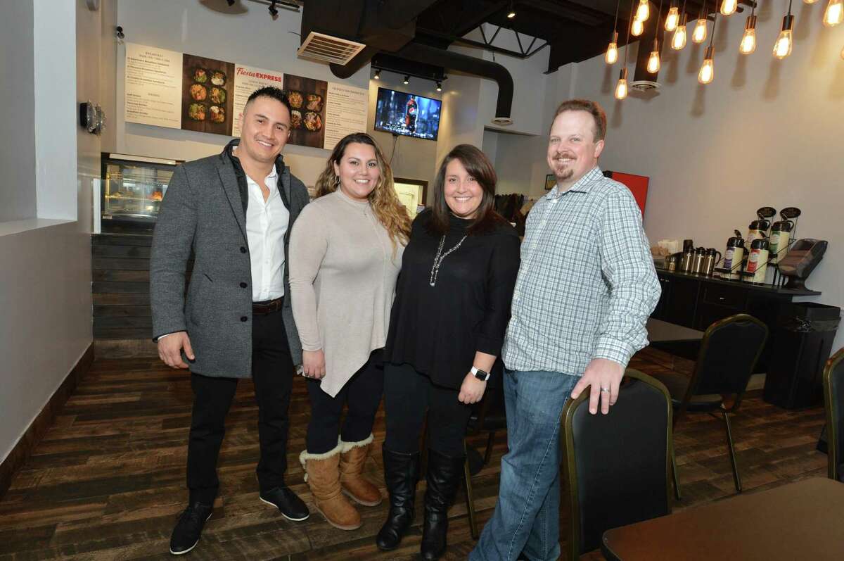 Fiesta Express co- owners Wilson and Shannon Portilla and Ashley and Victor Mathieu in their new Peruvian cuisine restaurant on Main Ave. Norwalk Conn. on Wednesday April 4, 2018