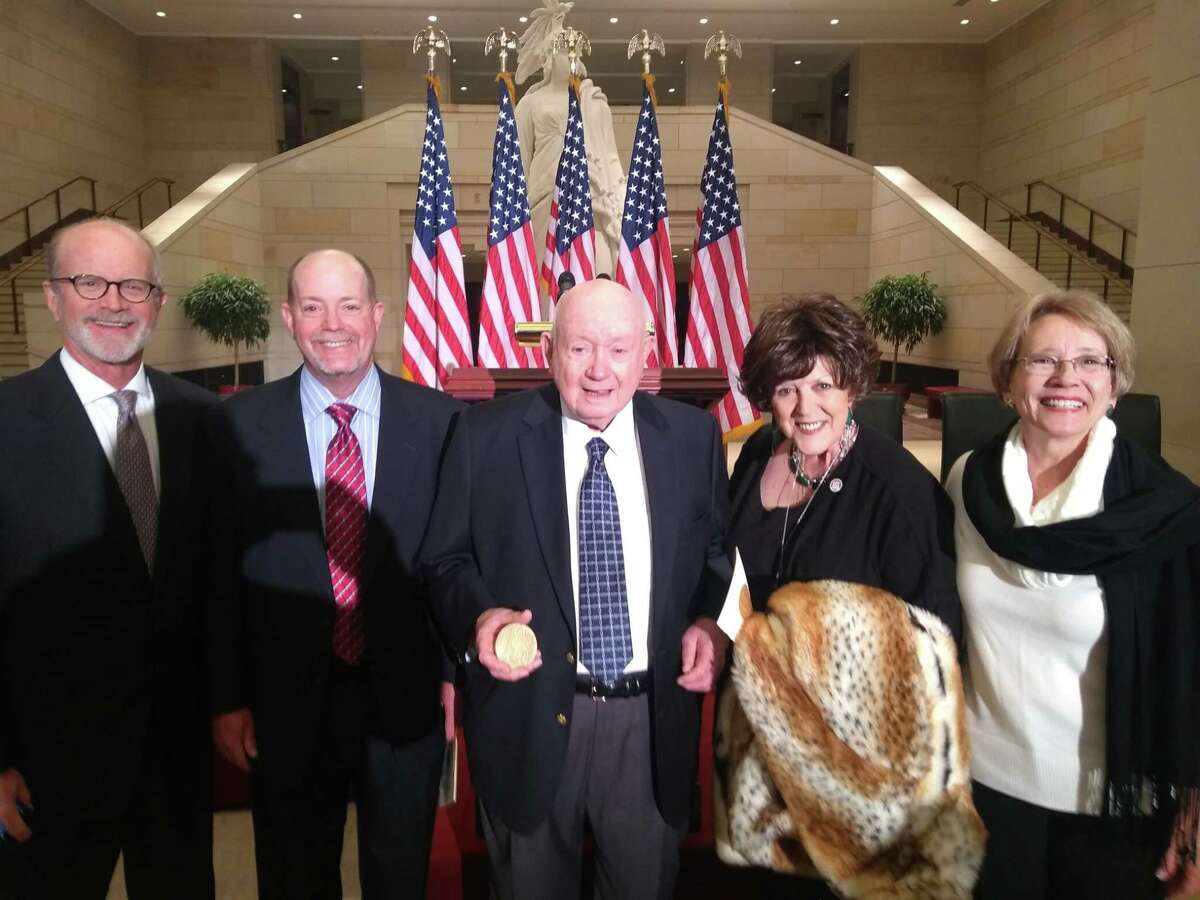 Jack Wheat, center, receives Congressional Gold Medal on behalf of all who served in the Office of Strategic Services (OSS). He is accompanied by his sons and daughters: (L-R) Lee Wheat, Matt Wheat, Stacey Bratton and Hilary Amacker.
