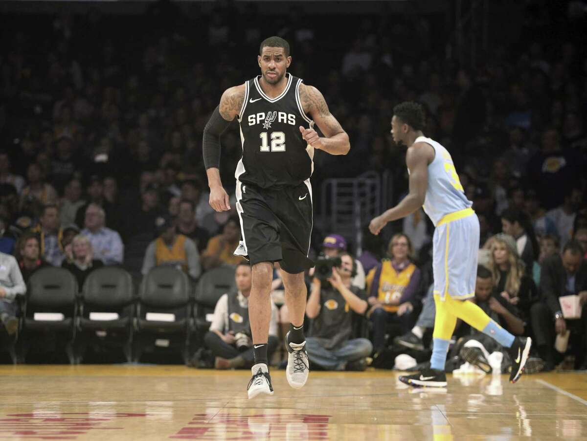 San Antonio Spurs forward LaMarcus Aldridge (12) during the first quarter of an NBA basketball game in Los Angeles Wednesday, April 4, 2018. The Lakers won in overtime 122-112. (AP Photo/Reed Saxon)