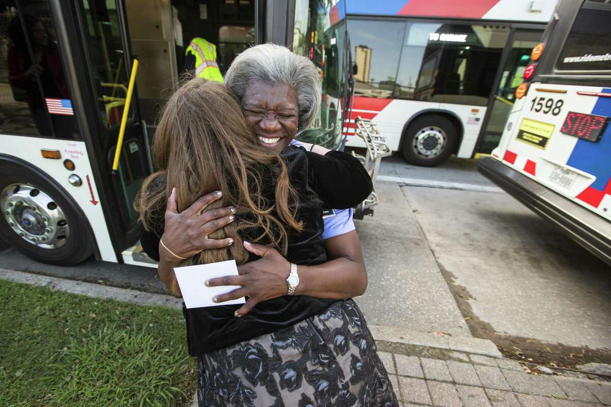 Bus driver Benita Johnson embraces Maria Town at a layover stop, as Town thanks her for her kindness on April 4. Johnson, a 20-year veteran Metro bus operator and trainer, is drawing acclaim for her treatment of a woman on Easter Sunday, who turned out to be the city's director of the office of people with disabilities. Johnson was strapping Town and her motorized scooter in on Sunday when some riders grumbled how long it was taking. Johnson scolded them and told them they'd be moving along as soon as Town was safe, then told her "No one’s gonna make you feel unworthy when you’re on my bus."
