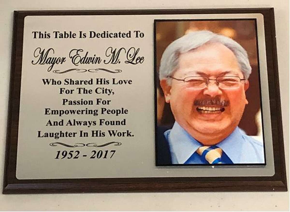 The plaque that hangs above table No. 5 at Sam’s Diner on Market Street honoring the late Mayor Ed Lee.