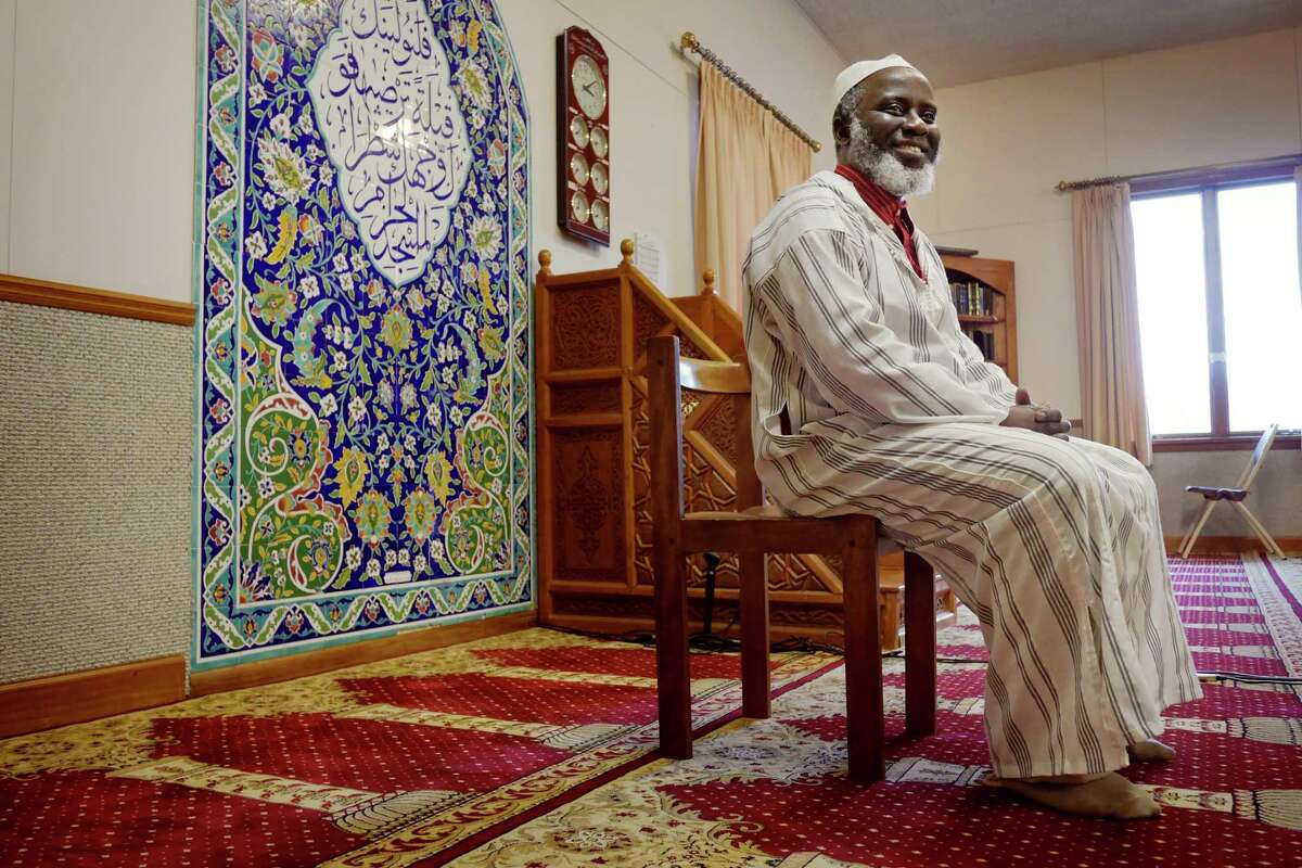 Imam Abdul-Rahman Yaki poses in the prayer room at the Islamic Center of the Capital District on Wednesday, April 4, 2018, in Colonie, N.Y. (Paul Buckowski/Times Union)