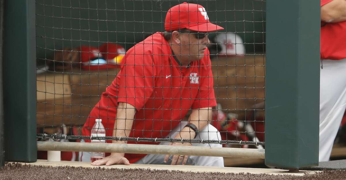 Houston head coach Todd Whitting (left) and assistant coach Trip Couch watch from the steps of the dugout during the NCAA baseball game between the Cincinnati Bearcats and the Houston Cougars at Schroeder Park on Saturday, May 20, 2017, in Houston, TX.