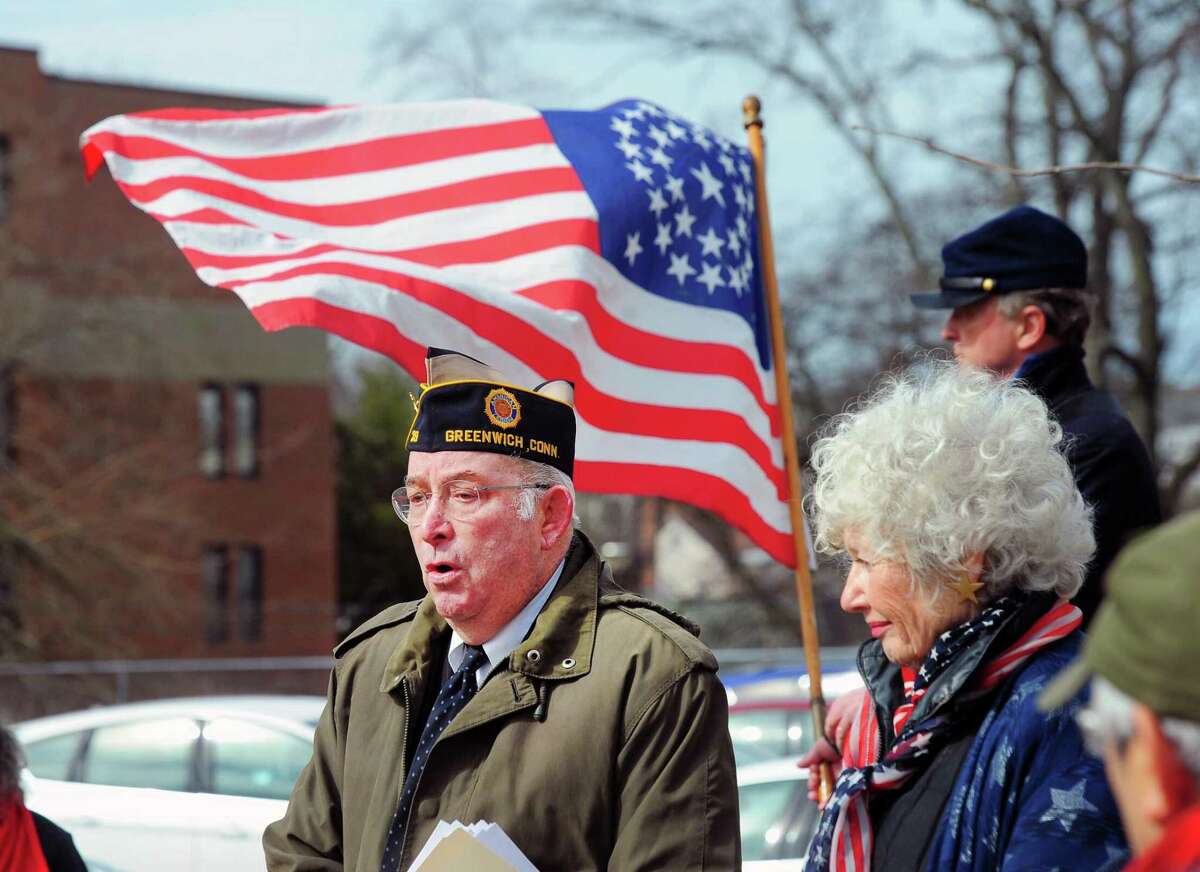 Erf Porter of the Greenwich Veterans Council spoke during the rededication of the Grand Army of the Republic Civil War Veterans Memorial in front of the Havemeyer Building in Greenwich, Conn., Saturday morning, April 7, 2018. A white oak tree was replanted as part of the ceremony that was put together by the Greenwich Veterans Council in cooperation with the Greenwich Historical Society to honor those Greenwich citizens who served and those died in the American Civil War. The original white oak at the memorial that was planted on April 9,1914, marking the anniversary of the Confederacy's surrender at Appomattox, was replaced with a new tree. Officials said the original tree was diseased and recently cut-down.