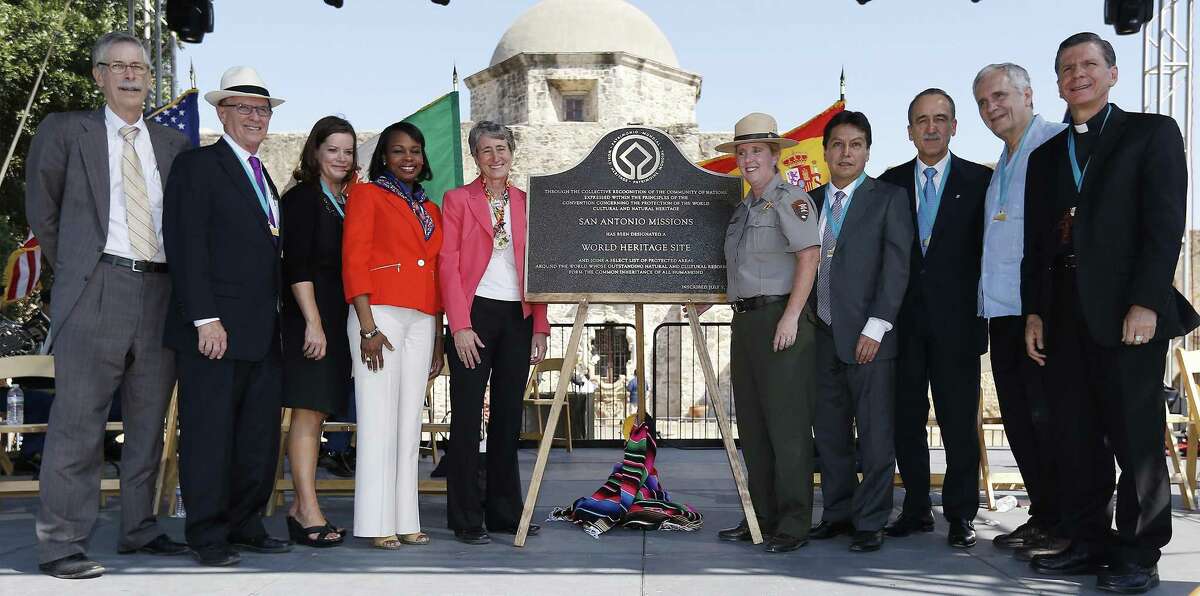 Officials gather for a photo around the plaque that will be placed on display at the World Heritage Inscription Ceremony at Mission San Jose on in October 2015. Officials pictured are (left to right): Michael Bean, deputy assistant Interior Secretary; Bexar County Judge Nelson Wolff; Alamo Director Becky Dinnin; Mayor Ivy Taylor; Interior Secretary Sally Jewell; National Parks Service Superintendent Mardi Arce; Mexican Counsel General Jose Larios Ponshe; Spanish Cultural Attache Enric Panes; U.S. Rep. Lloyd Doggett and Archbishop Gustavo Garcia-Siller. Last year, Dinnin became executive director of the Remember the Alamo Foundation, an endowment subsidiary created to raise funds for promotion and implementation of the Alamo master plan. She resigned last week, saying she wants to pursue other opportunities.