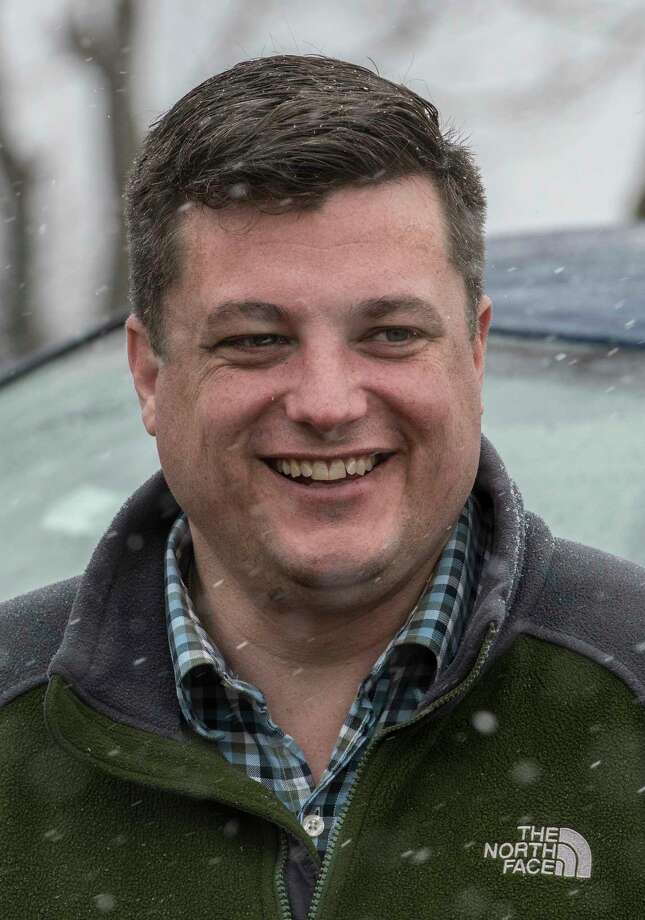 Assembly candidate Jake Ashby, on a visit with farm owner Charles Peter Friday. 6, 2018 in Schodack, N.Y. (Skip Dickstein/Times Union) Photo: SKIP DICKSTEIN / 20043450A