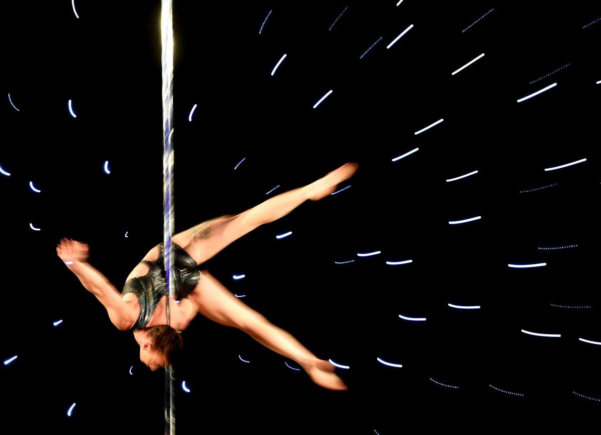 Photos Of Pole Dancing Competition Show Just How Hard It Actually Is