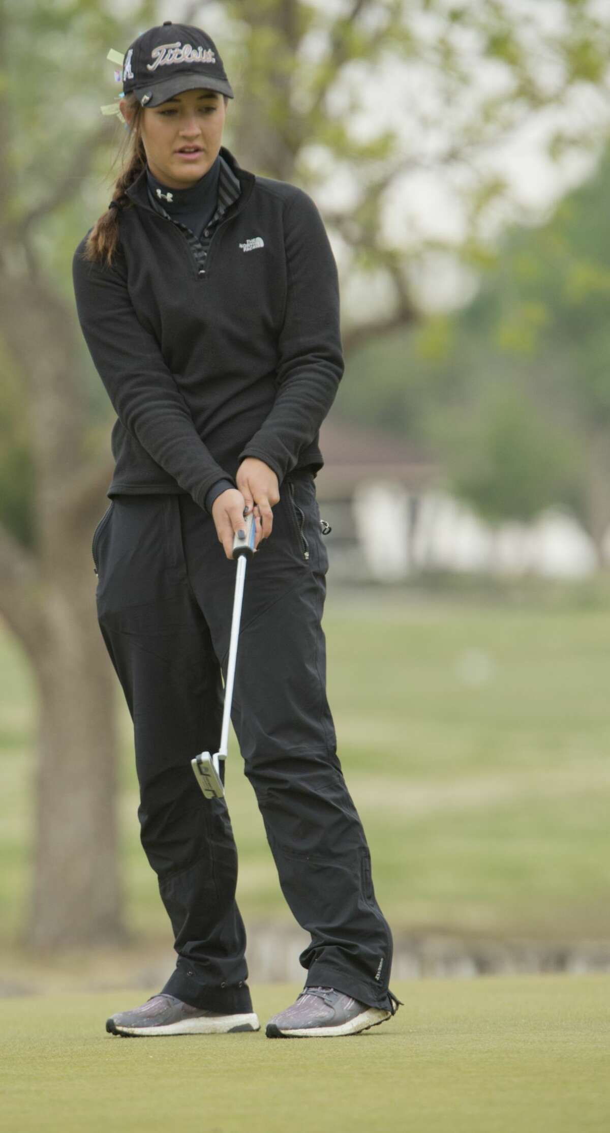 Andrews' Rachel Huffman follows her putt 04/09/18 during District 4-4A golf at Ranchland Hills Golf Club. Tim Fischer/Reporter-Telegram
