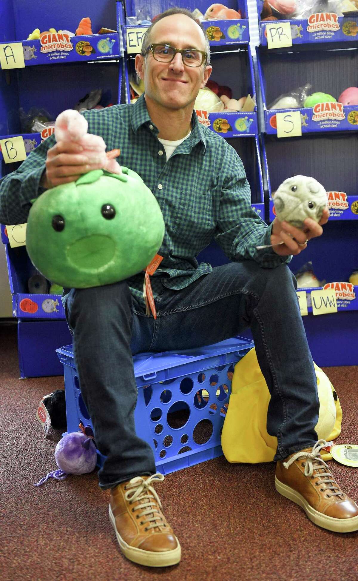Andrew Klein, CEO of Giant Microbes, a Stamford-based toymaker is photographed on April 6, 2018 in Stamford, Connecticut. Klein's company recently released plush dolls depicting sexually transmitted diseases, such as Chlamydia and Herpes, along with eight other commonly known STD's, as part of the STD awareness month campaign.
