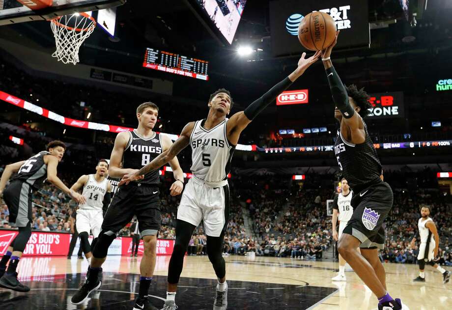 san antonio spurs guard dejounte murray (5) grabs for a rebound