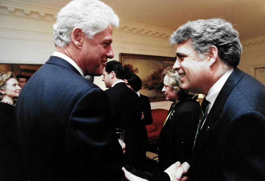 Former assemblyman and Albany historian Jack McEneny, right, is pictured with President Bill Clinton. McEneny traveled to Ireland several times in the 1980s and 90s and supported negotiations by Pres. Bill Clinton and Sen. George Mitchell to make the Good Friday peace agreement happen. (Provided)