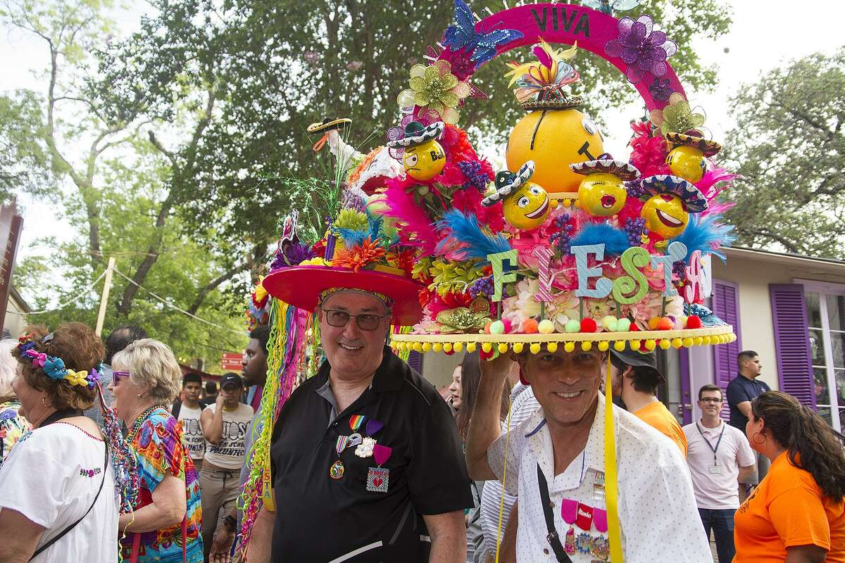 Hats, the bigger the better, are a welcome sight at NIOSA. Here, Guy Prichard (left) and Tye Wichert rock the tradition in head wear they made for Fiesta on April 25, 2017.
