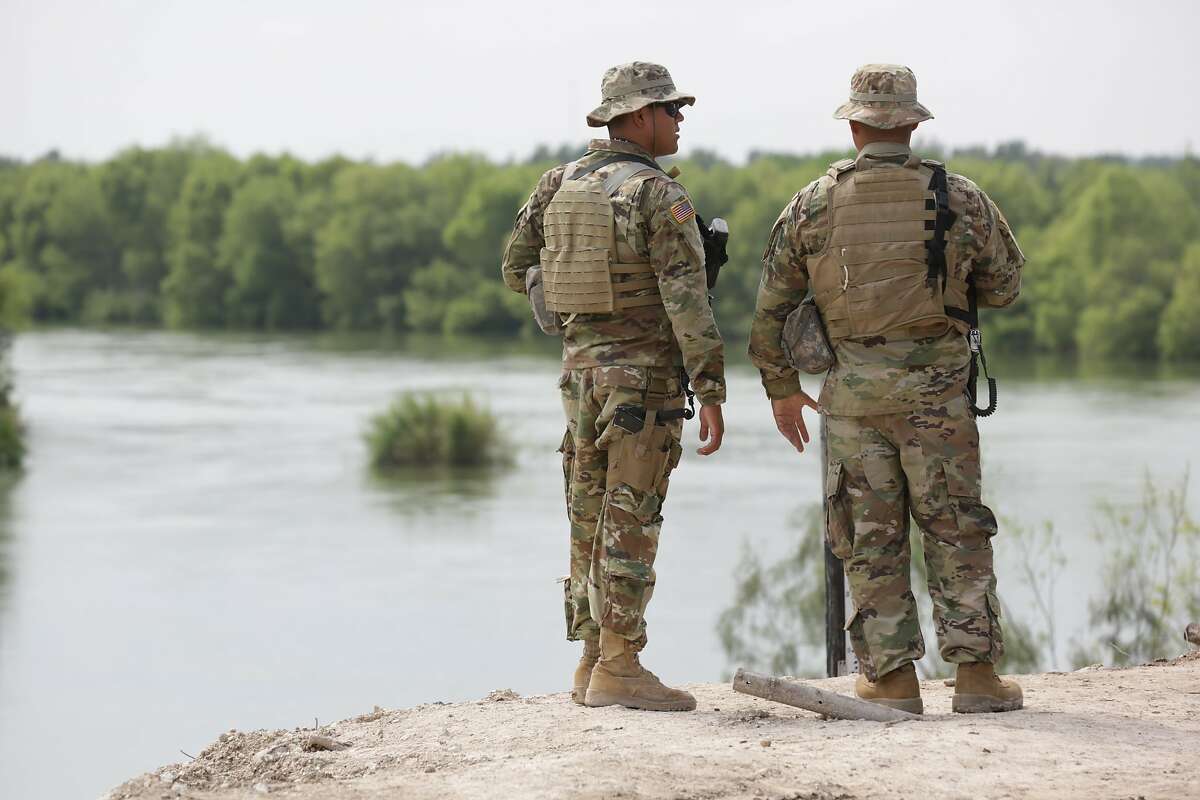 Members of the Texas National Guard man a post along the Rio Grande River in Starr County, on Tuesday, April 10, 2018.