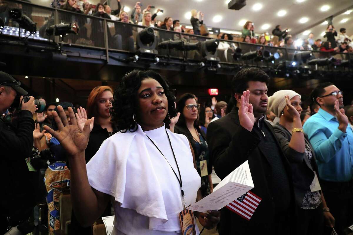 NEW YORK, NY - APRIL 10: Candidates for U.S. citizenship are administered the Oath of Allegiance by U.S. Supreme Court Justice Ruth Bader Ginsburg for U.S. citizenship at the New-York Historical Society on April 10, 2018 in New York City. Two hundred candidates from 59 countries participated in the morning ceremony becoming American citizens. (Photo by Spencer Platt/Getty Images)