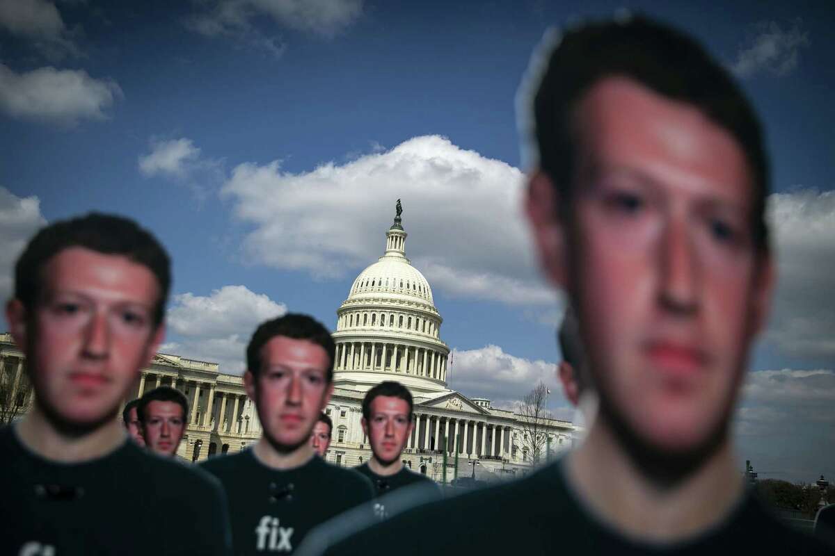 Cutouts of Facebook's Mark Zuckerberg are displayed near the Capitol in Washington, D.C., on April 10, 2018.