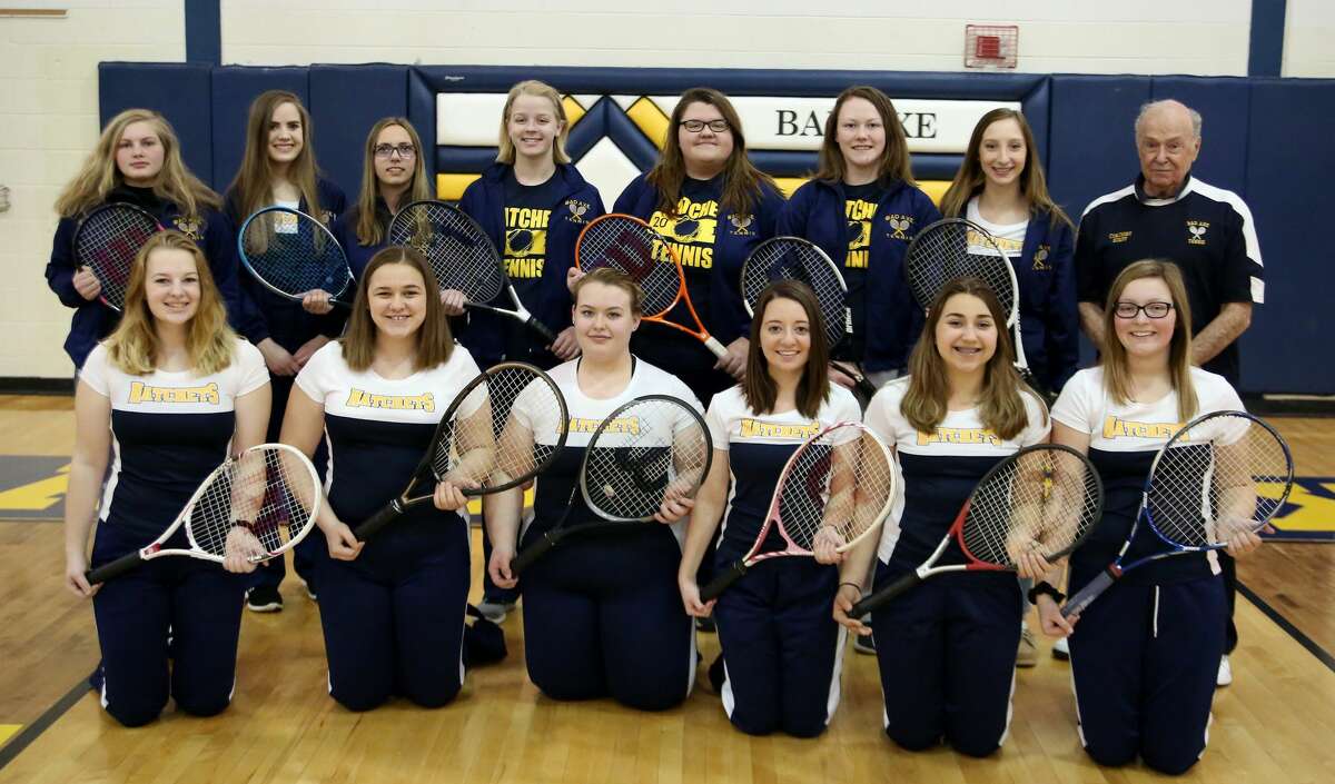 Members of the Bad Axe tennis team are (front row from left) Meadow Glass, Megan Booms, Adriana Prill, Devynn Brown, Katey Krohn and Holly Hunt (back row) Kyla Gilbert, Jordan Reinhardt, Kylee Janssen, Diana Hass, Aurora Krueger, Abbi Drews, Jaclyn Campbell and coach Mike Cowles.