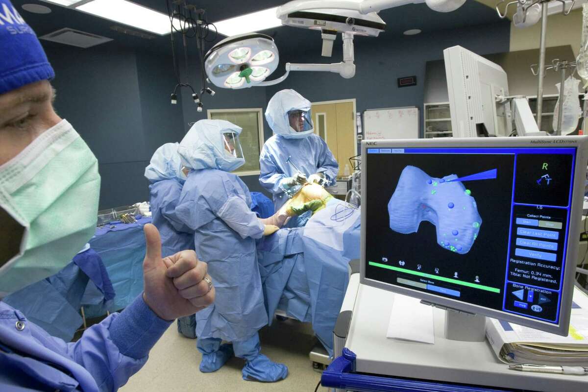 A patient's knee is prepared for a knee resurfacing procedure using the MAKO System.
