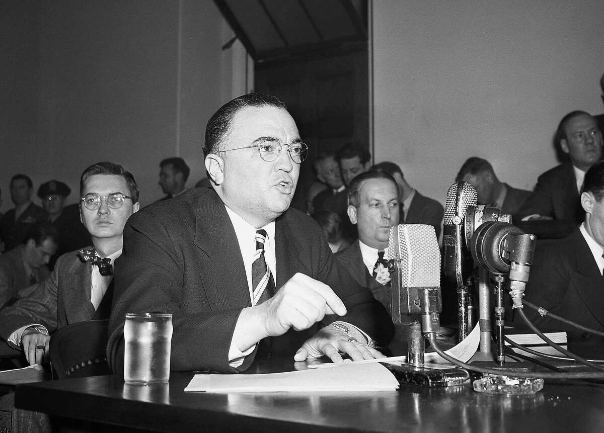 This March 26, 1947, file photo shows Federal Bureau of Investigation Director J. Edgar Hoover calling the communist party of the United States a "Fifth Column" whose "goal is the overthrow of our government" during testimony before the House Un-American Activities Committee in Washington. Fearing a Russian invasion and occupation of Alaska, the U.S. government in the early Cold War years recruited and trained fishermen, bush pilots, trappers and other private citizens across Alaska for a covert network to feed wartime intelligence to the military, newly declassified Air Force and FBI documents show. Hoover teamed up on a highly classified project, code-named �Washtub,� with the newly created Air Force Office of Special Investigations, headed by Hoover protege and former FBI official Joseph F. Carroll. (AP Photo/File)