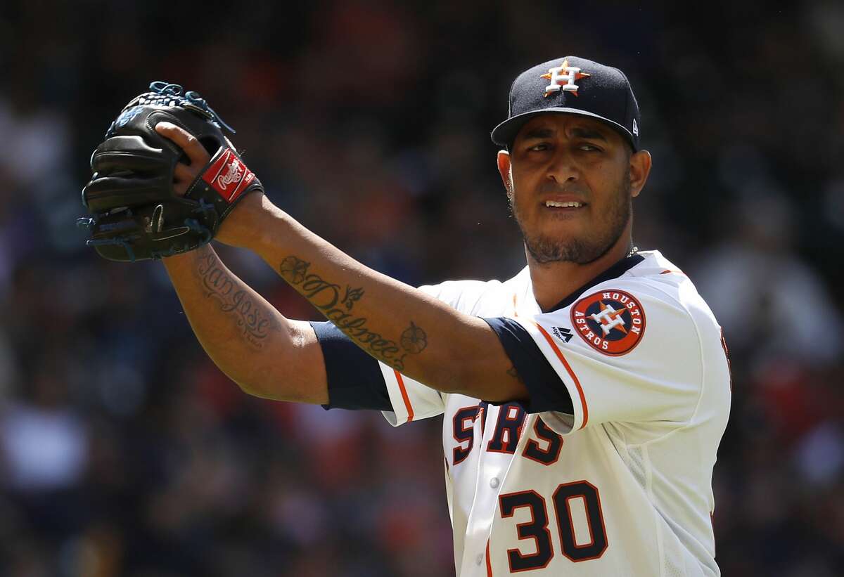 Houston Astros relief pitcher Hector Rondon (30) reacts after the final out of the fifth inning of an MLB baseball game at Minute Maid Park, Wednesday, April 4, 2018, in Houston. ( Karen Warren / Houston Chronicle )