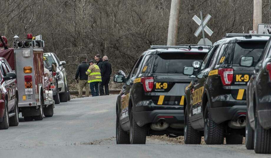 Representatives from Homeland Security, Saratoga County Sheriff Mike Zurlo and fire are scene near a line of law enforcement vehicles near where a device that looked like a pipe bomb was located near Zepko Road Wednesday April 11, 2018  in Ballston Spa, N.Y. (Skip Dickstein/Times Union) Photo: SKIP DICKSTEIN, Albany Times Union