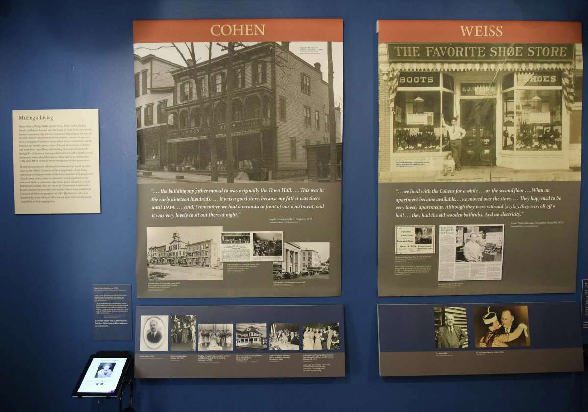 Posters show information and photos regarding some of the first Jewish families to settle in Greenwich at the "An American Odyssey: The Jewish Experience in Greenwich" exhibit at the Greenwich Historical Society. The exhibition runs through Sunday.