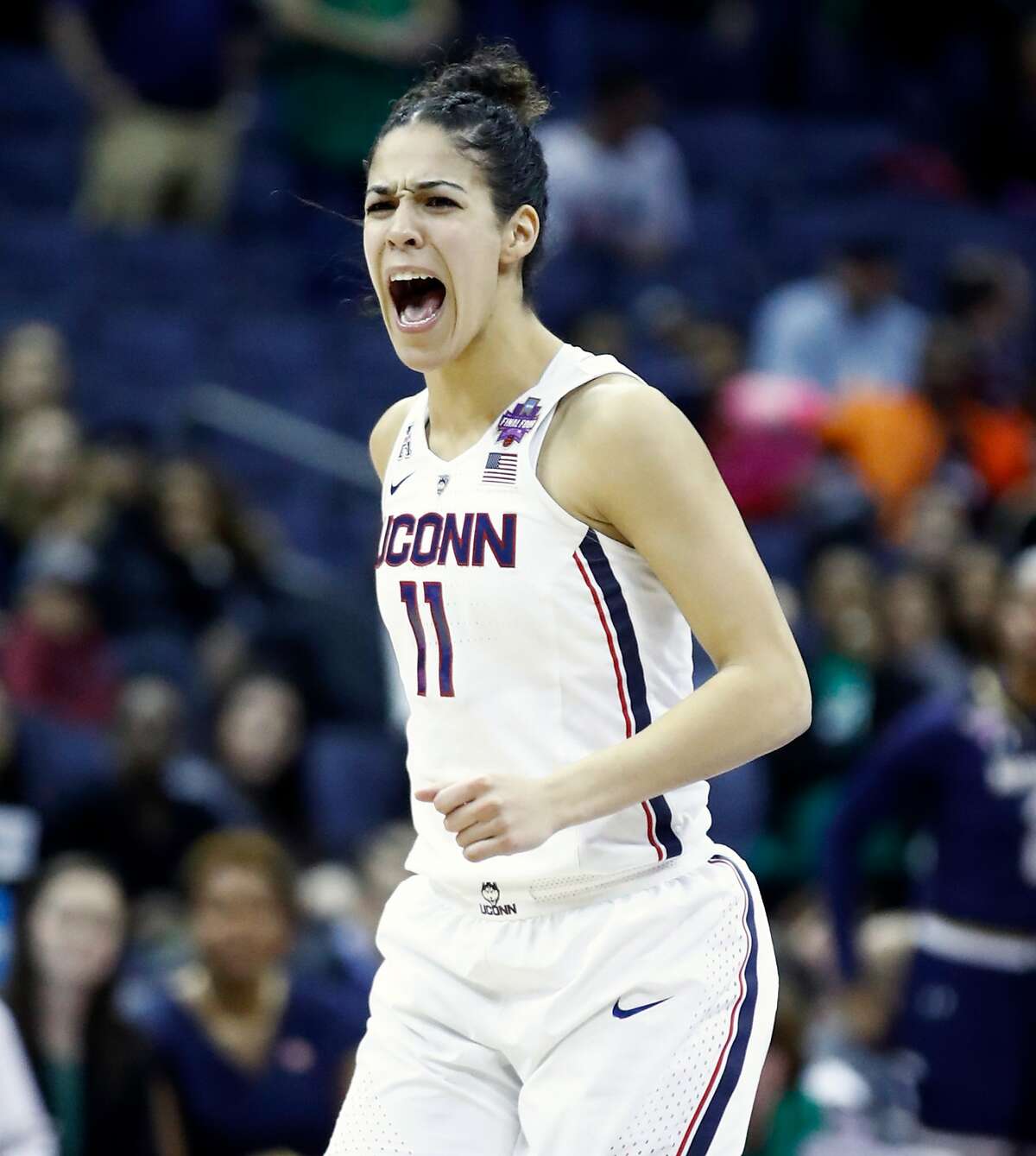 COLUMBUS, OH - MARCH 30: Kia Nurse #11 of the Connecticut Huskies celebrates after hiting the game tieing basket late in the second half to force overtime against the Notre Dame Fighting Irish in the semifinals of the 2018 NCAA Women's Final Four at Nationwide Arena on March 30, 2018 in Columbus, Ohio. The Notre Dame Fighting Irish defeated the Connecticut Huskies 91-89. (Photo by Andy Lyons/Getty Images)