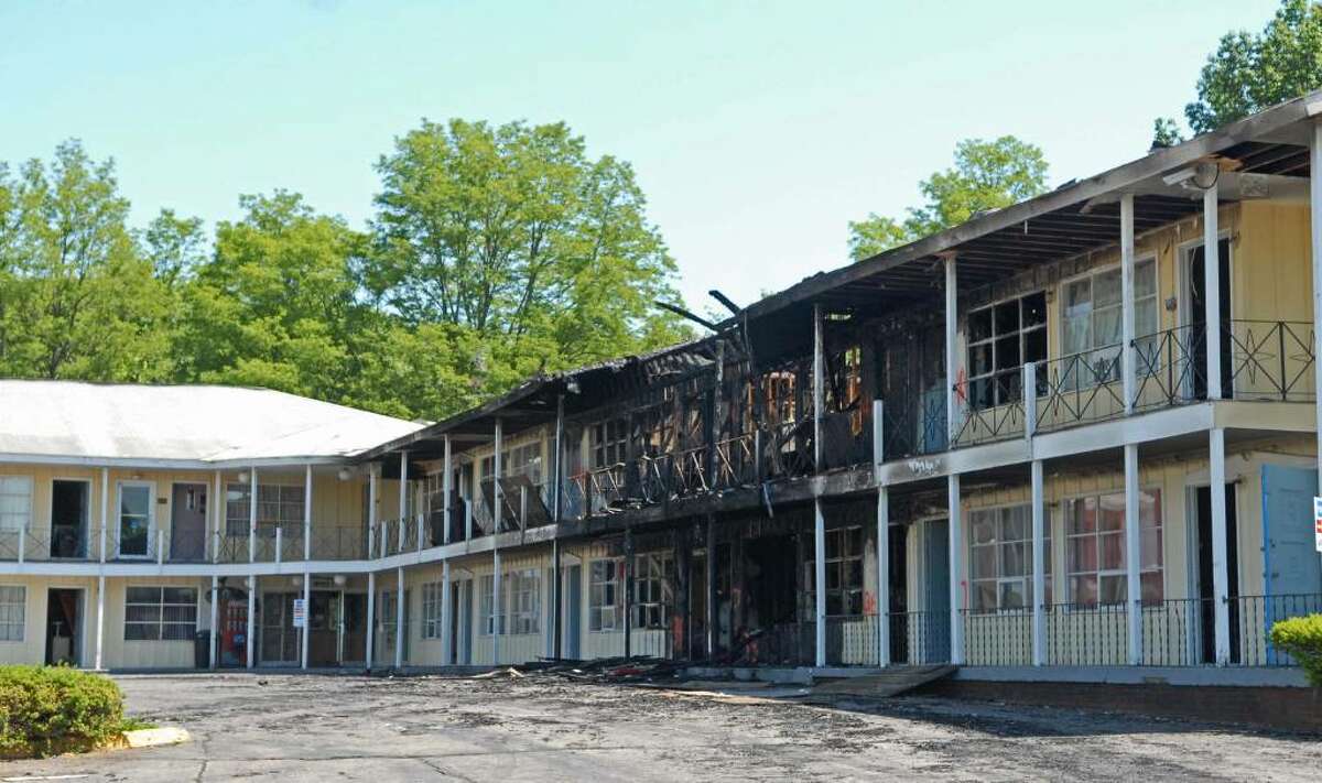 Fire Monday heavily damaged several rooms at the Governors Inn & Suites in Guilderland. (Paul Buckowski / Times Union)