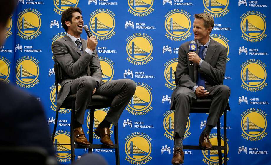 Team general manager Bob Myers, (left) and new the Golden State Warriors head coach Steve Kerr, share a laugh during a press conference at their training facility in Oakland, Calif., on Tuesday May 20, 2014. Photo: Michael Macor / The Chronicle
