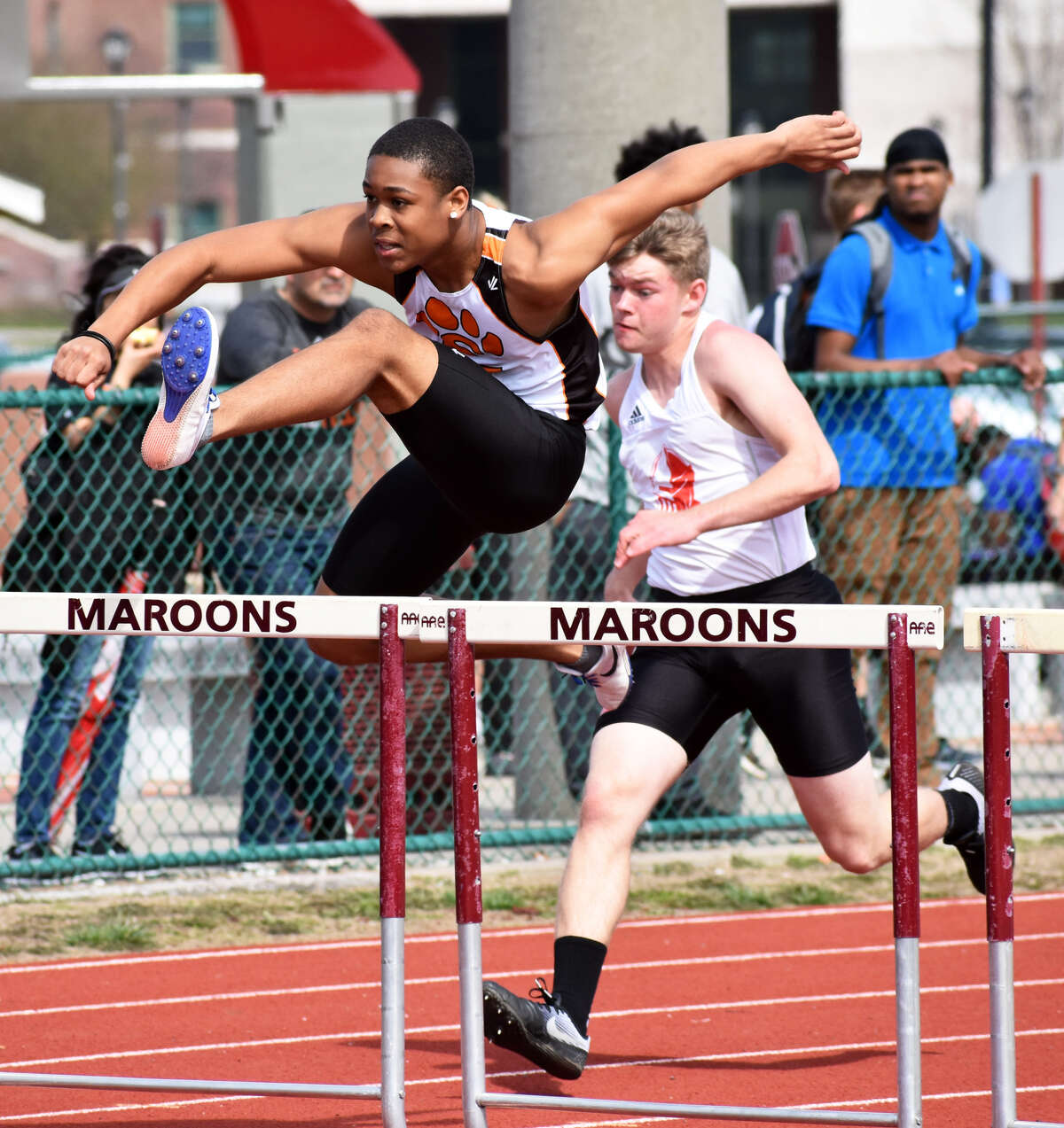 Edwardsville’s Xavier McKenney competes in the 110-meter hurdles at the Belleville West Norm Armstrong Invitational.