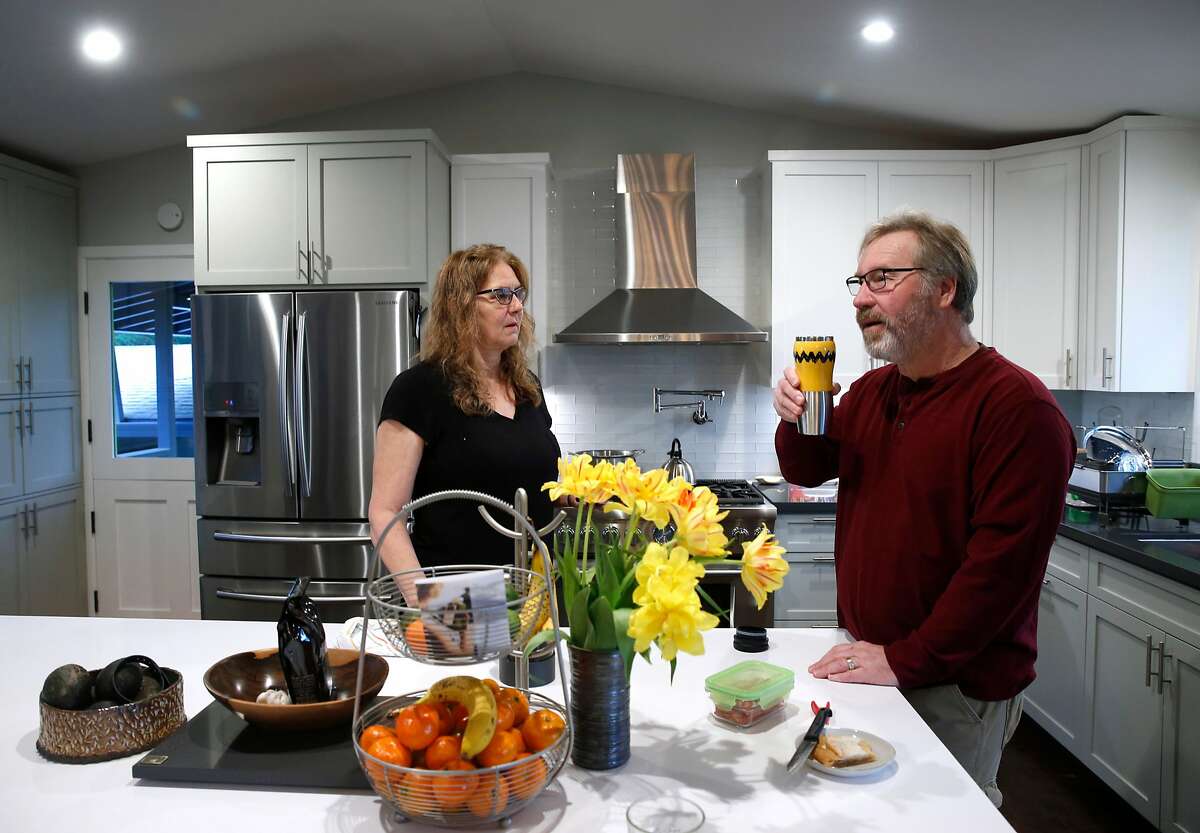 M.J. Dub� and and her husband Hans Dippel finish breakfast at their temporary rental home in Santa Rosa, Calif. on Wednesday, April 11, 2018. Rebuilding the family's Fountaingrove home that was destroyed in the Tubbs Fire could be delayed because of potential contamination from underground plastic pipes, melted from the intense heat from the fire, and may have leeched benzine into the soil and water supply.