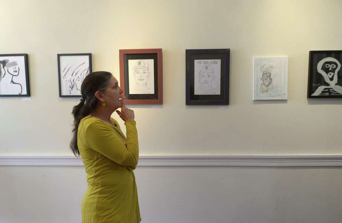 Keystone art instructor and curator of the show, Michelle Beyman, discusses the exhibit of artwork by Keystone House clients, Nature of the Mind, Thursday, April 12, 2018, at ARTWorks Gallery on the Green in Norwalk, Conn. Keystone House is a Norwalk facility that serves individuals with psychosocial challenges. The exhibit will be the focal point of Saturdays Slow Art Day in Norwalk and the opening reception for the show will be Sunday from 2-4pm.