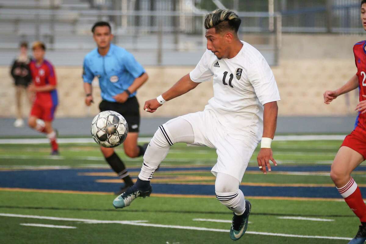ConroeÂ?’s Alexis Ochoa (11) kicks the ball during the boys soccer game against Pearce on Friday, April 6, 2018, at Corsicana High School. (Michael Minasi / Houston Chronicle)