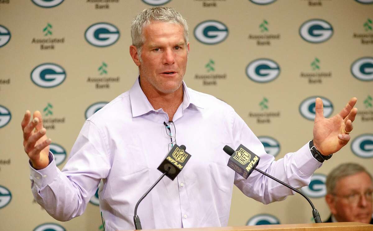 Former Green Bay Packers NFL football quarterback Brett Favre talks at a news conference prior to being inducted into the Packers Hall of Fame and having his No. 4 jersey retired Saturday July 18, 2015, at Lambeau Field in Green Bay, Wis. (AP Photo/Mike Roemer)