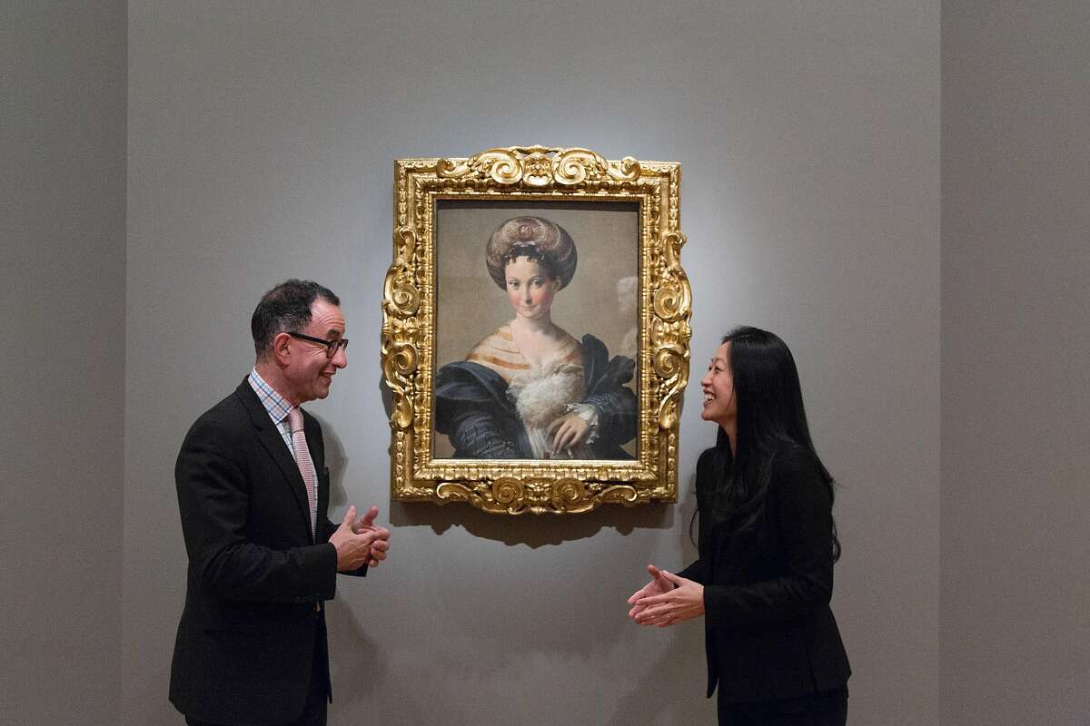 Fine Arts Museums director Colin Bailey with Aimee Ng, a curator from the Frick in New York who has written a small catalog for the show, in front of a celebrated painting by Parmagianino at the Legion of Honor in San Francisco, Calif., Friday July 26, 2014